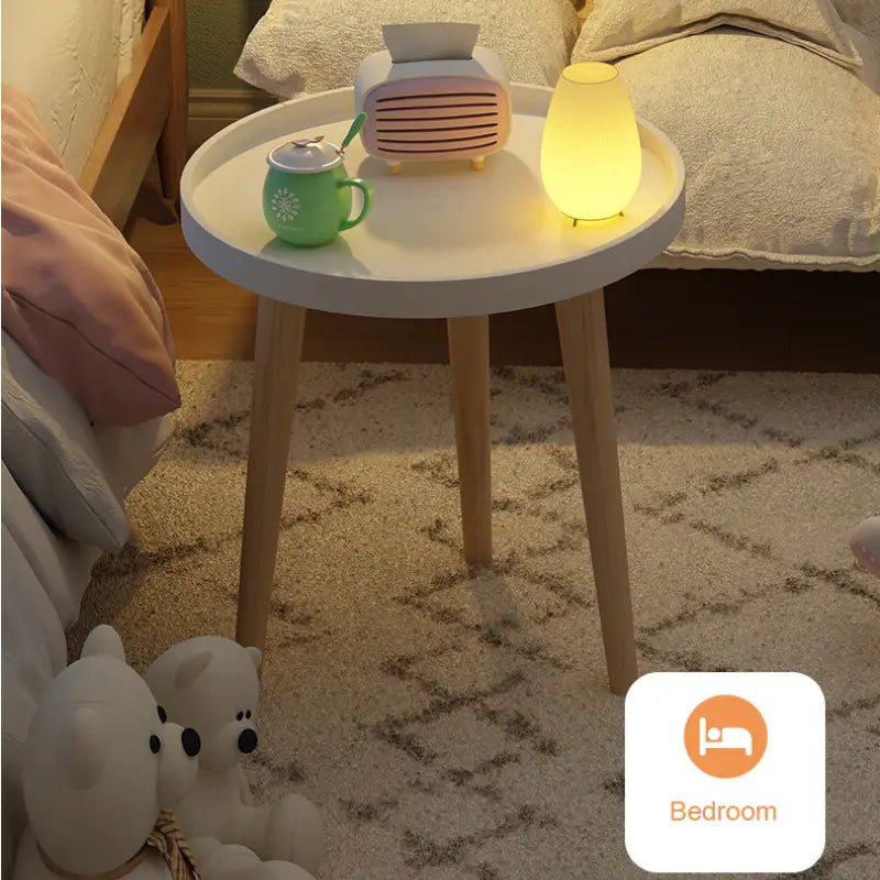 Embrace Elegance with the Round Coffee Table Boasting Three Harmonious Legs