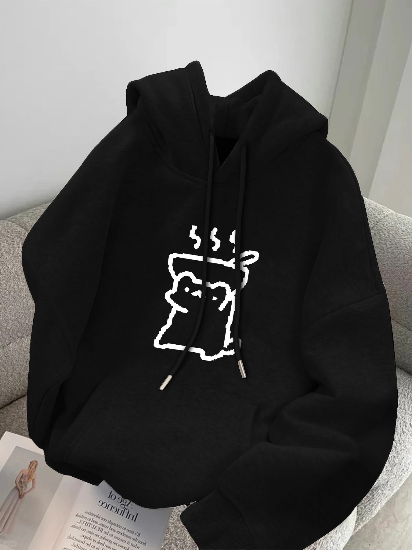 Bowl-Wearing Figure Graphic Hoodie
