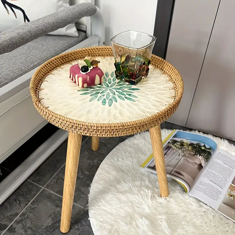 Understated elegance meets Nordic sensibilities in the Rattan Shell Table