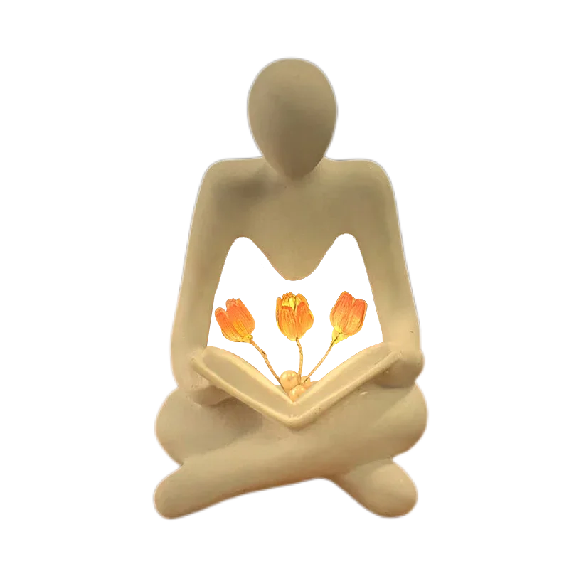 Elegance Illuminated: Abstract Figure Statue Lamp for Stylish Table Decor