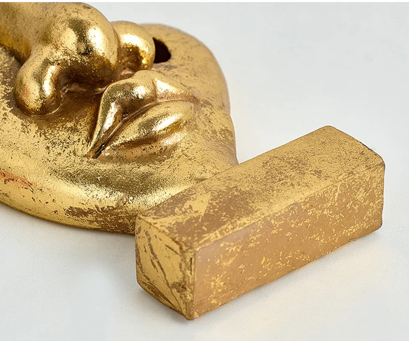 Sculpted Splendor: Elevate Your Space with Golden Face Art