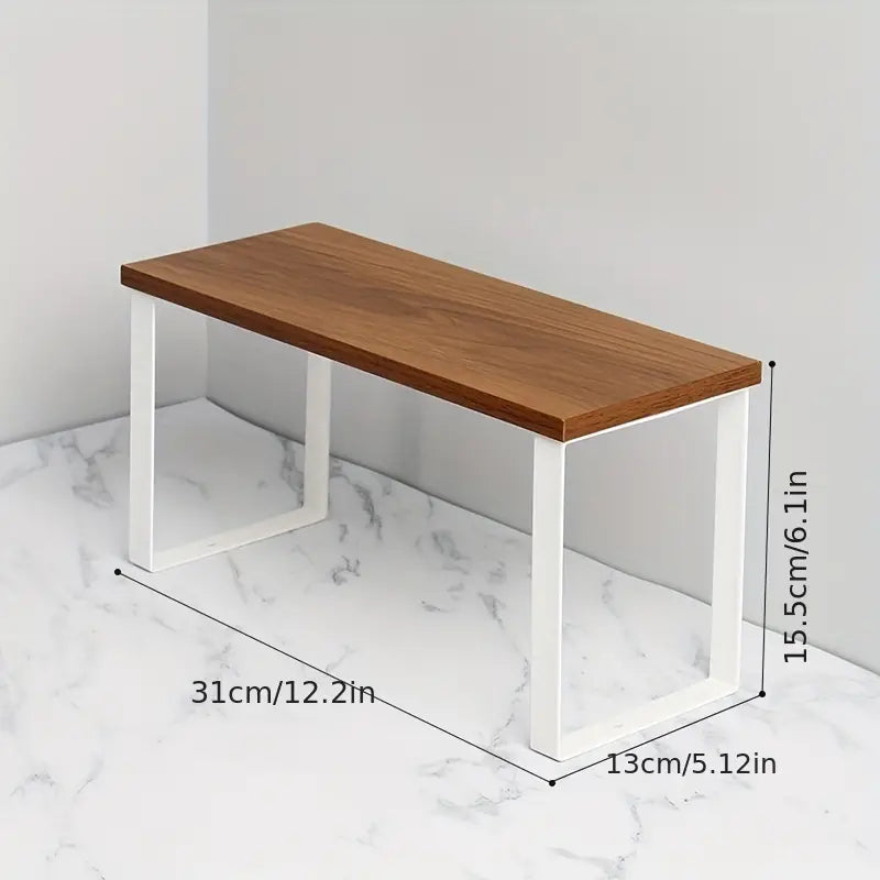 Achieve a tidy ironing setup with this versatile Desktop Iron Storage Rack