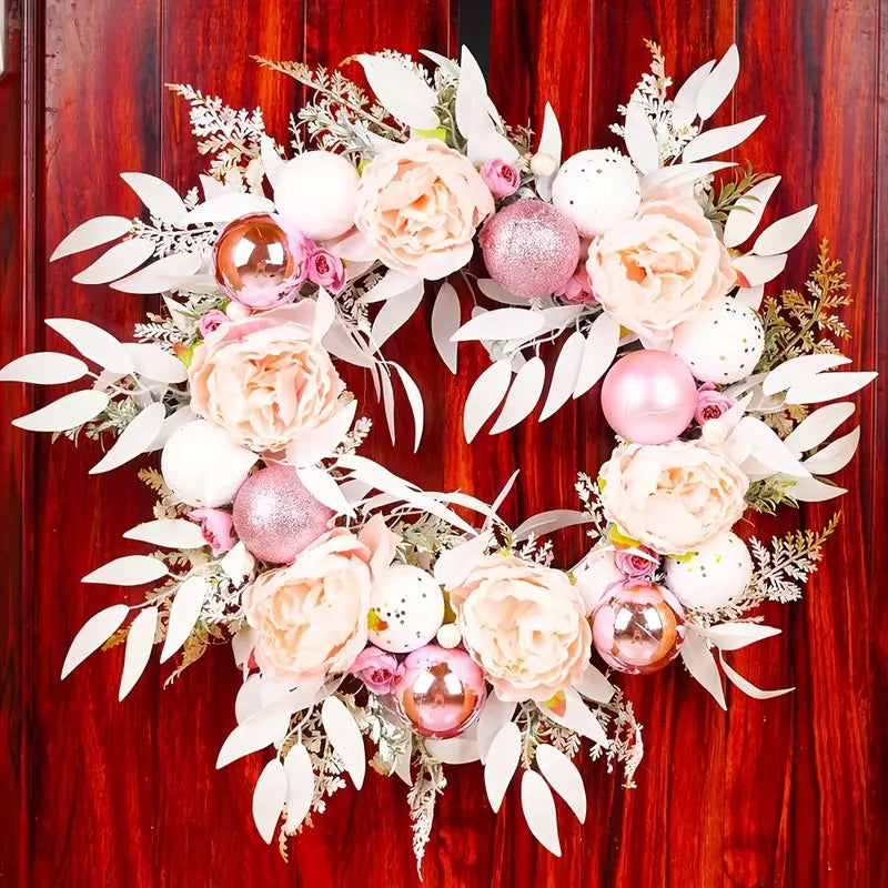 Blushing Elegance: A Pink Christmas Wreath Adorned with Baubles