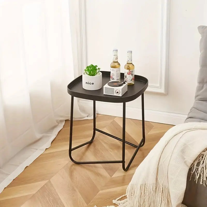 Experience the perfect marriage of style and utility with this modern side table