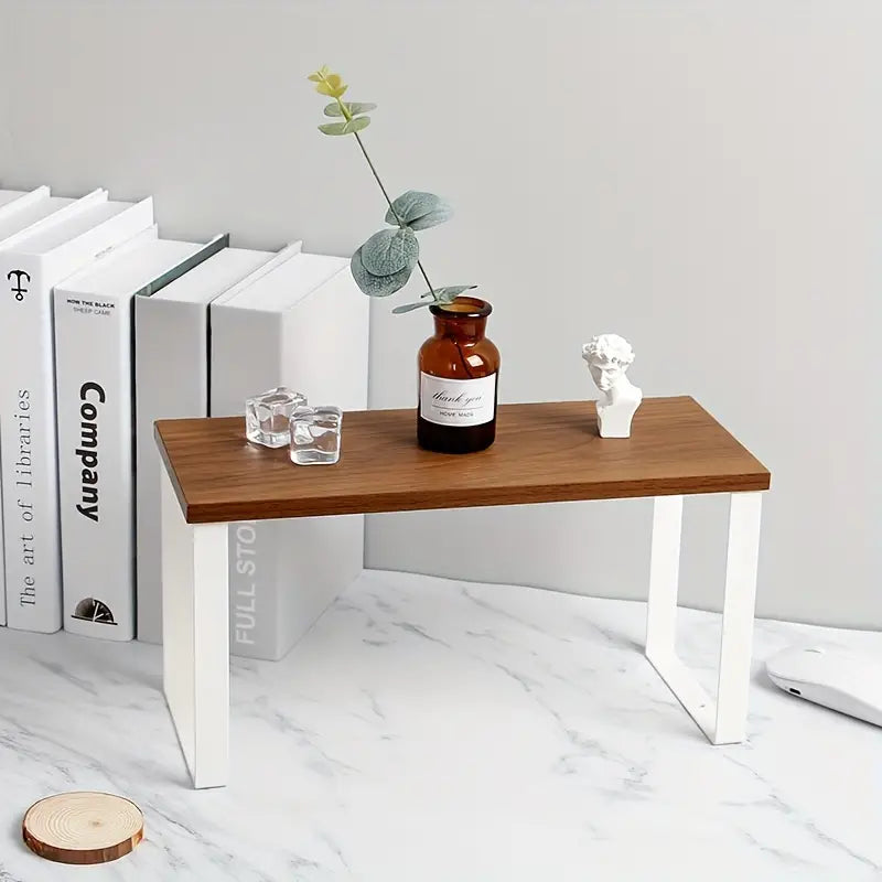 Achieve a tidy ironing setup with this versatile Desktop Iron Storage Rack