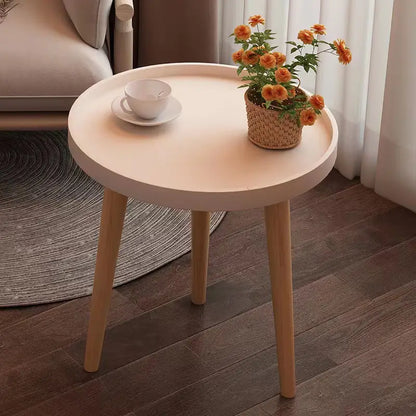 Embrace Elegance with the Round Coffee Table Boasting Three Harmonious Legs