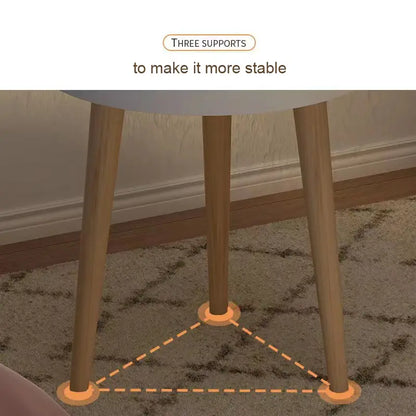 Embrace Elegance with the Round Coffee Table Boasting Three Harmonious Legs