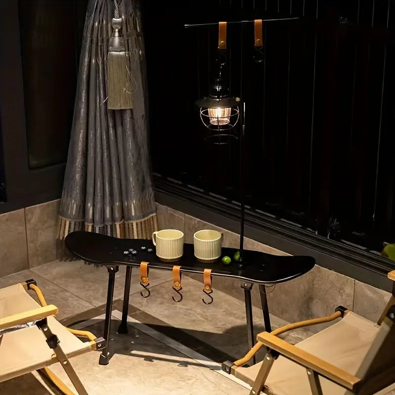 Black Skateboard Shape Courtyard Camping Table - Foldable & Lightweight