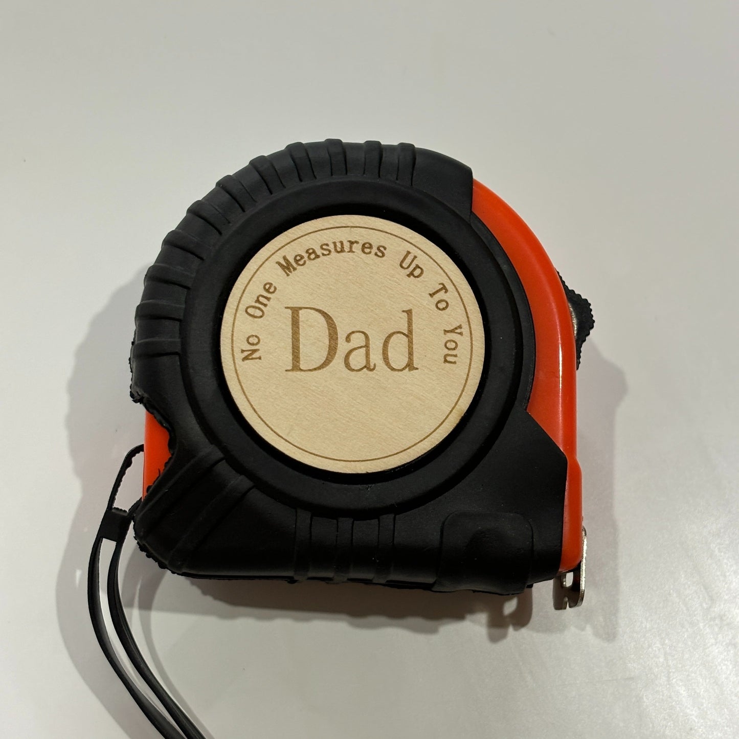 Unique 'No One Measures Up' Wooden Tape Measure – Orange Metal Lock