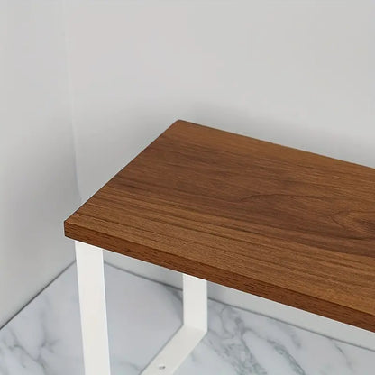 Achieve a tidy ironing setup with this versatile Desktop Iron Storage Rack