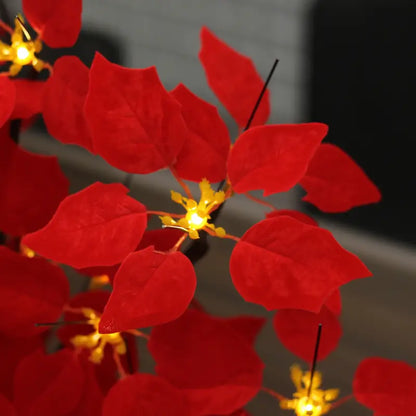 Blooming Brilliance: Poinsettia Flower Tree with Festive Lights