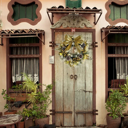 Golden Christmas Wreath with Pine Cones and Bow