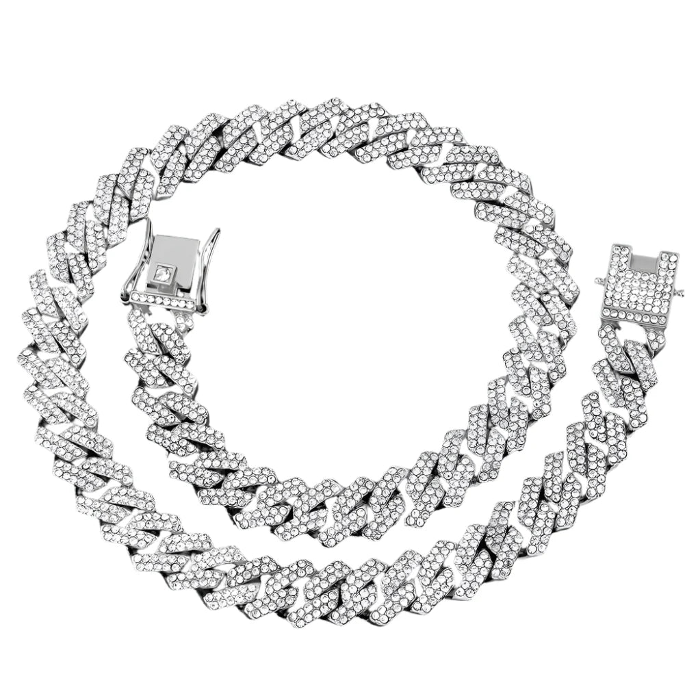 Silver chain necklace with diamond-like stones on a black background