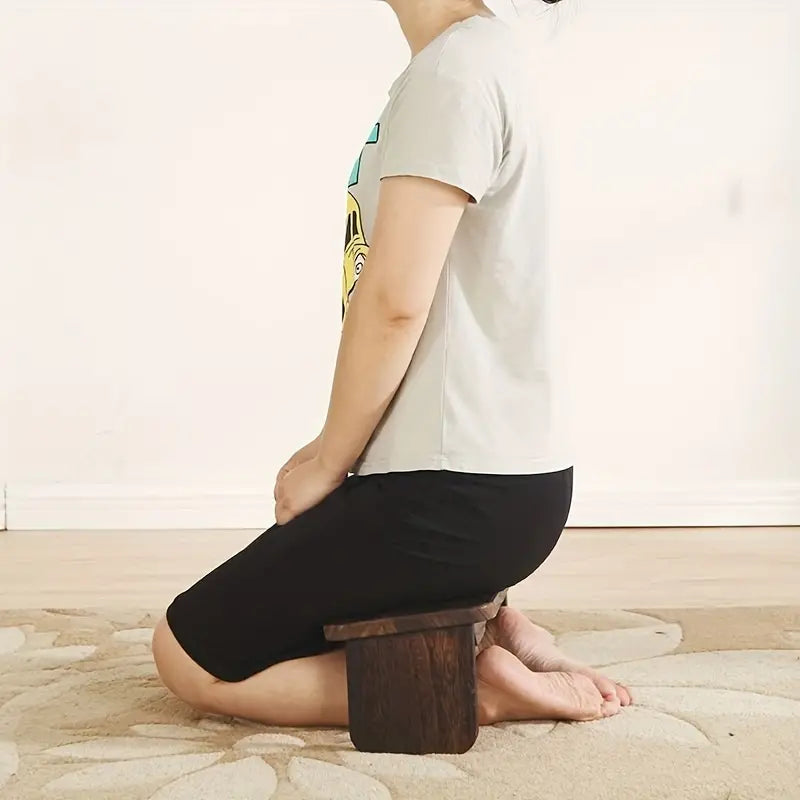 A folding yoga meditation bench supports deep inner peace
