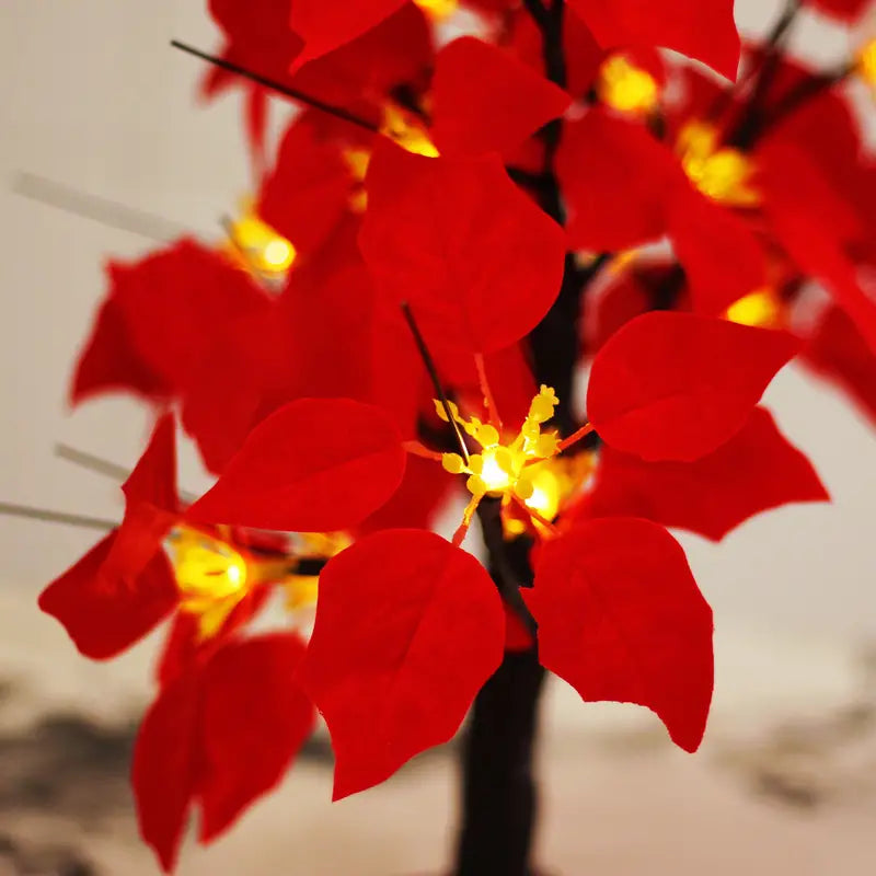 Blooming Brilliance: Poinsettia Flower Tree with Festive Lights
