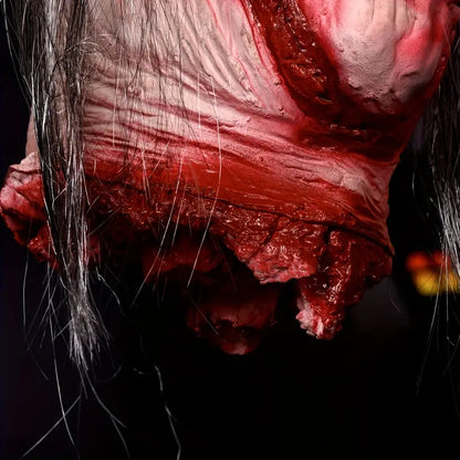 Crimson Haunting: The Ghostly Fake Man Head