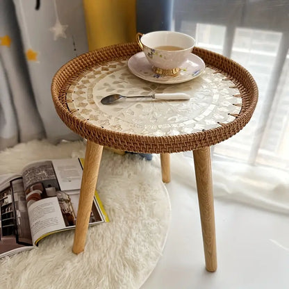 Understated elegance meets Nordic sensibilities in the Rattan Shell Table